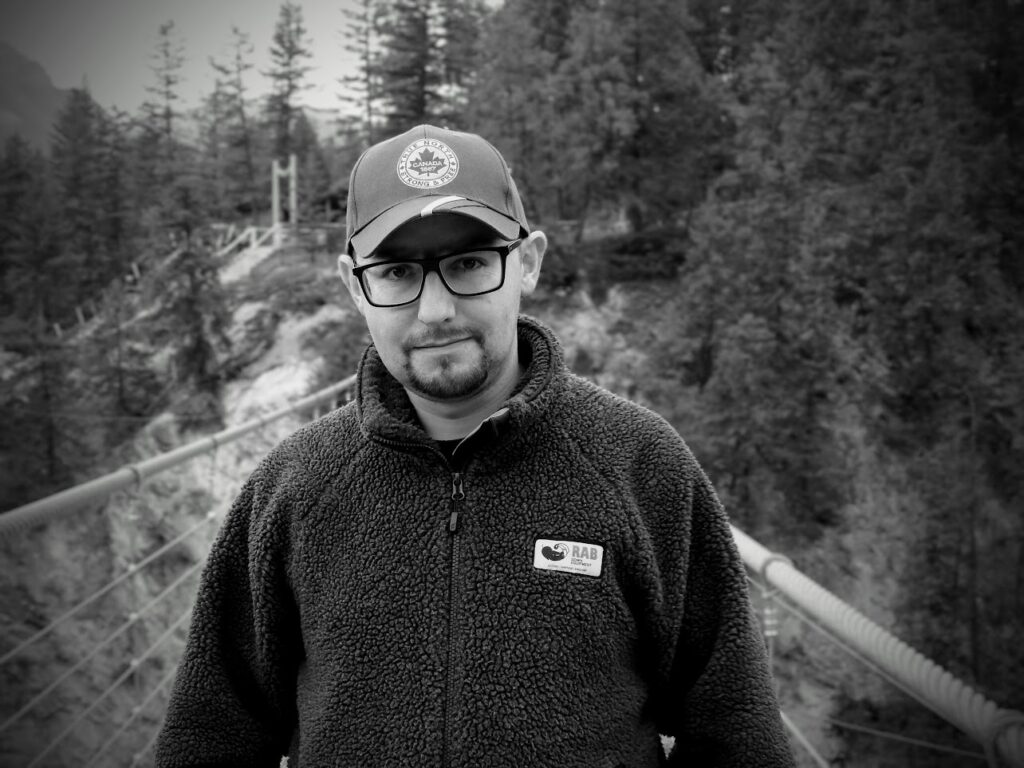 Sam Sharpe standing on a mountain walkway
